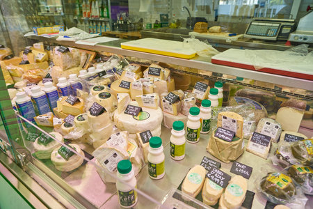 MILAN, ITALY - CIRCA NOVEMBER, 2017: cheese on display at Bio c'Bon supermarket in Milan.のeditorial素材