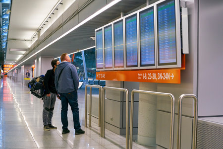 WARSAW, POLAND - CIRCA NOVEMBER, 2017: Flight schedule monitors in Warsaw Chopin Airport.のeditorial素材