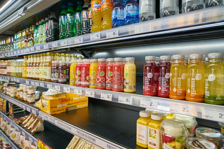 MILAN, ITALY - CIRCA NOVEMBER, 2017: drinks on display at Carrefour Express store in Milanのeditorial素材
