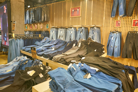 MILAN, ITALY - CIRCA NOVEMBER, 2017: clothing on display at Bershka store in Milan.