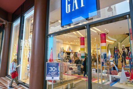 MILAN, ITALY - CIRCA NOVEMBER, 2017: entrance and window display at GAP store in Milan.のeditorial素材