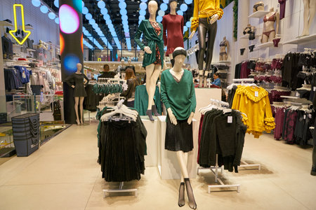 MILAN, ITALY - CIRCA NOVEMBER, 2017: clothing on display at retail store in Milan.