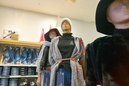 MILAN, ITALY - CIRCA NOVEMBER, 2017: clothing on display at GAP store in Milan. GAP is an American worldwide clothing and accessories retailer.のeditorial素材