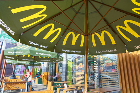 KALININGRAD, RUSSIA - CIRCA APRIL, 2018: close up shot a umbrella at McDonald's restaurant in...