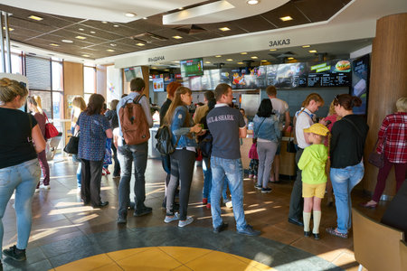 NIZHNY NOVGOROD, RUSSIA - CIRCA MAY, 2018: people in McDonald's restaurant. McDonald's is an...