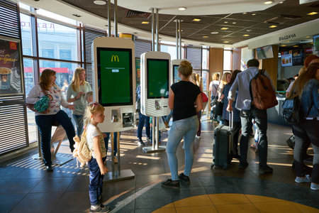 NIZHNY NOVGOROD, RUSSIA - CIRCA MAY, 2018: self-ordering kiosk at McDonald's restaurant. McDonald's is an American hamburger and fast food restaurant chain.のeditorial素材