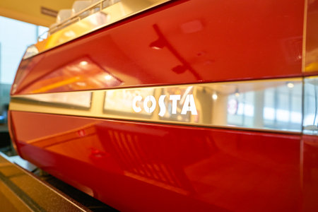 NIZHNY NOVGOROD, RUSSIA - CIRCA JULY, 2018: close up shot of Costa sign on coffee machine in Strigino International Airport.のeditorial素材