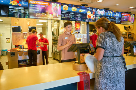 MOSCOW, RUSSIA - CIRCA AUGUST, 2018: counter service in McDonald's restaurant.