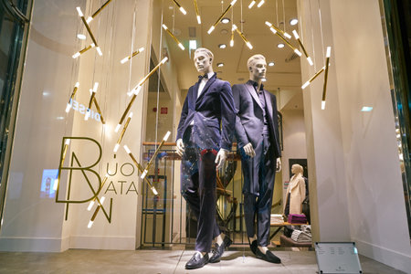 MILAN, ITALY - CIRCA NOVEMBER, 2017: shop window display of clothing at a Massimo Dutti store in...