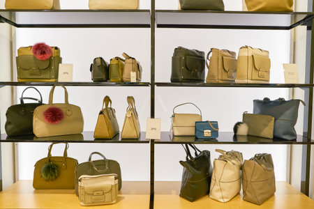 ROME, ITALY - CIRCA NOVEMBER, 2017: bags on display at Furla store in Fiumicino International Airport.のeditorial素材