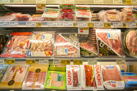 MILAN, ITALY - CIRCA NOVEMBER, 2017: assortment of meat products on display for sale at supermarket in Milan.のeditorial素材