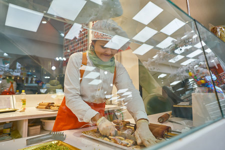 MILAN, ITALY - CIRCA NOVEMBER, 2017: worker at OD Store confectionery outlet in Milan.のeditorial素材