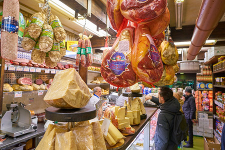 MILAN, ITALY - CIRCA NOVEMBER, 2017: assortment of cheese and meat products on display in shop in Milan.のeditorial素材