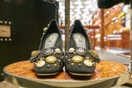 MILAN, ITALY - CIRCA NOVEMBER, 2017: shoes on display at Dolce & Gabbana store in Milan. Dolce & Gabbana is an Italian luxury fashion house.のeditorial素材
