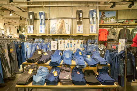 MILAN, ITALY - CIRCA NOVEMBER, 2017: clothing on display at retail store in Milan.のeditorial素材