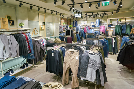 MILAN, ITALY - CIRCA NOVEMBER, 2017: clothing on display at retail store in Milan.