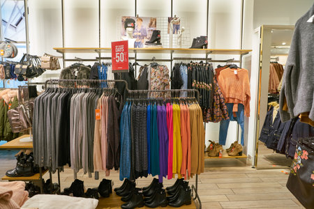 MILAN, ITALY - CIRCA NOVEMBER, 2017: clothing on display at retail store in Milan.
