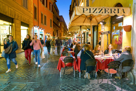 ROME, ITALY - CIRCA NOVEMBER, 2017: people eat at restaurant in Rome. Rome is the capital city of Italy.のeditorial素材