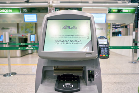 ROME, ITALY - CIRCA NOVEMBER, 2017: self check-in kiosk with processing credit card terminal in...