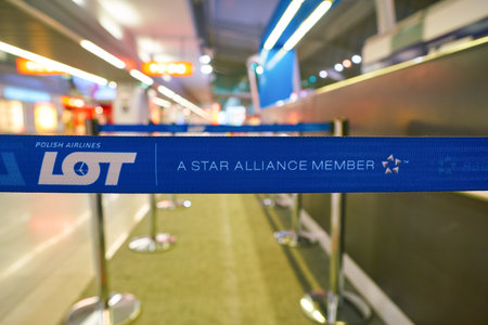 WARSAW, POLAND - CIRCA NOVEMBER, 2017: close up shot of LOT sign Warsaw Chopin Airport.
