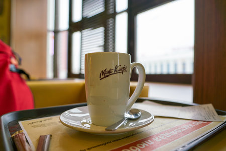 NIZHNY NOVGOROD, RUSSIA - CIRCA JULY, 2018: close up shot of a cup with McCafe sign in McDonald's restaurant. McDonald's is an American hamburger and fast food restaurant chain.のeditorial素材