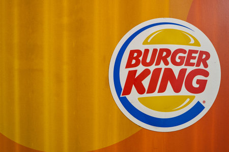 DUSSELDORF, GERMANY - CIRCA SEPTEMBER, 2018: close up shot of Burger King sign. Burger King is an American global chain of hamburger fast food restaurants.のeditorial素材