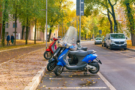 MILAN, ITALY - CIRCA NOVEMBER, 2017: parked motor scooters in Milan. Milan is a city in northern Italy.のeditorial素材