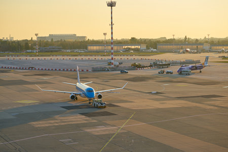 DUSSELDORF, GERMANY - CIRCA OCTOBER, 2018: KLM Cityhopper aircraft on pushback at Dusseldorf Airport.のeditorial素材