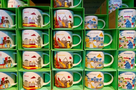 DUSSELDORF, GERMANY - CIRCA OCTOBER, 2018: mugs on display at Starbucks coffee shop in Dusseldorf.のeditorial素材
