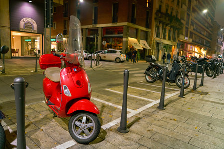 MILAN, ITALY - CIRCA NOVEMBER, 2017: parked motor scooters in Milan. Milan is a city in northern Italy.のeditorial素材