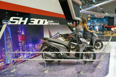 MILAN, ITALY - NOVEMBER 11, 2017: scooters on display at EICMA 2017 - 75th International Motorcycle Exhibition.のeditorial素材