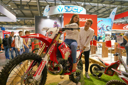 MILAN, ITALY - NOVEMBER 11, 2017: a model poses for the visitors during the EICMA 2017 - 75th...