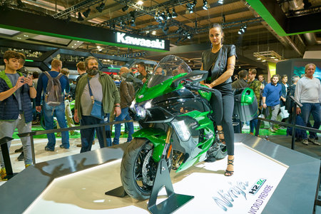 MILAN, ITALY - NOVEMBER 11, 2017: a model poses for the visitors during the EICMA 2017 - 75th...
