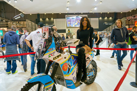MILAN, ITALY - NOVEMBER 11, 2017: a model poses for the visitors during the EICMA 2017 - 75th...