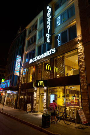 DUSSELDORF, GERMANY - CIRCA SEPTEMBER, 2018: McDonald's restaurant in Dusseldorf at night.のeditorial素材