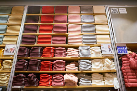 MOSCOW, RUSSIA - CIRCA SEPTEMBER, 2018: clothing on display at Uniqlo store in Moscow. Uniqlo Co....