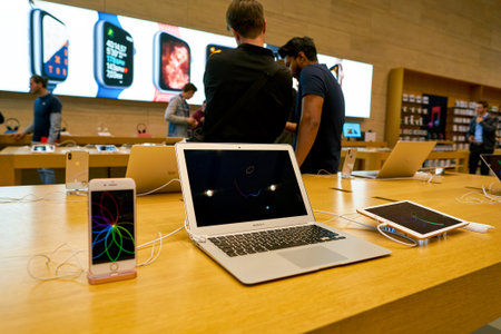 DUSSELDORF, GERMANY - CIRCA SEPTEMBER, 2018: MacBook Air on display at Apple store in Dusseldorf.