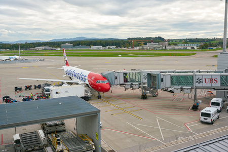 ZURICH, SWITZERLAND - CIRCA OCTOBER, 2018: an aircraft on tarmac in Zurich International Airport.のeditorial素材