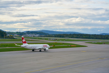 ZURICH, SWITZERLAND - CIRCA OCTOBER, 2018: Swiss International Air Lines aircraft taxiing at Zurich International Airport.のeditorial素材