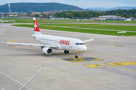 ZURICH, SWITZERLAND - CIRCA OCTOBER, 2018: Swiss International Air Lines aircraft taxiing at Zurich International Airport.のeditorial素材