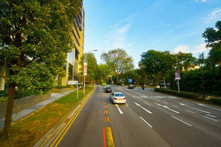 SINGAPORE - APRIL 04, 2019: Singapore urban landscape seen from second deck of double-decker bus.のeditorial素材