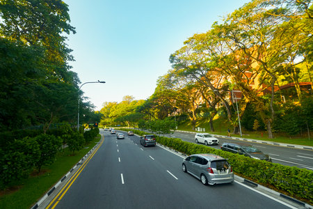 SINGAPORE - APRIL 04, 2019: Singapore urban landscape seen from second deck of double-decker bus.のeditorial素材
