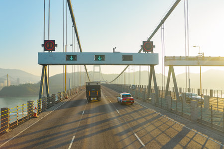 HONG KONG, CHINA - CIRCA JANUARY, 2019: view of a bridge taken from second deck of double-decker bus...