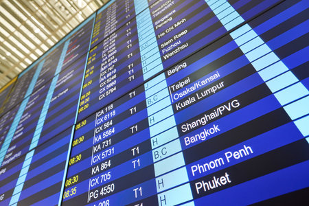 HONG KONG, CHINA - CIRCA JANUARY, 2019: close up shot of flight schedule monitors in Hong Kong International Airport.のeditorial素材