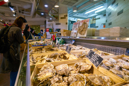 HONG KONG, CHINA - CIRCA FEBRUARY, 2019: oysters on display at City'super supermarket in Hong Kong. City'super specialises in imported produce and goodsのeditorial素材