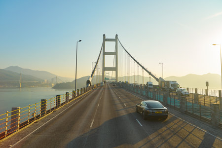 HONG KONG, CHINA - CIRCA JANUARY, 2019: view of a bridge taken from second deck of double-decker bus...