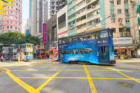 HONG KONG, CHINA - CIRCA JANUARY, 2019: typical HKT double-decker trams in Hong Kong in the daytime.のeditorial素材