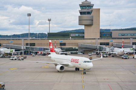 ZURICH, SWITZERLAND - CIRCA OCTOBER, 2018: Swiss International Air Lines aircraft taxing at Zurich International Airport.のeditorial素材