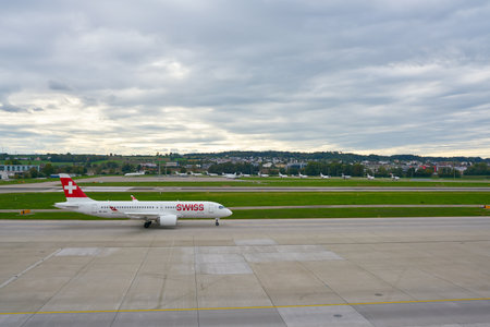 ZURICH, SWITZERLAND - CIRCA OCTOBER, 2018: Swiss International Air Lines aircraft taxing at Zurich International Airport.のeditorial素材