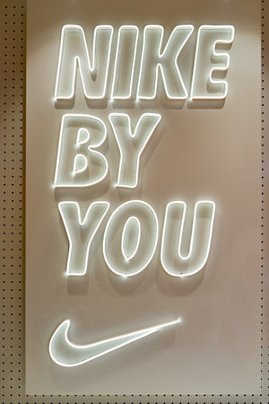 SINGAPORE - CIRCA APRIL, 2019: close up shot of Nike by You inscription at Nike store in Jewel...